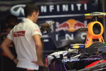 World © Octane Photographic Ltd. F1 Monaco - Monte Carlo - Pitlane. Total engineer in Infiniti Red Bull Racing RB9 garage. Friday 24th May 2013. Digital Ref : 0695cb7d1416