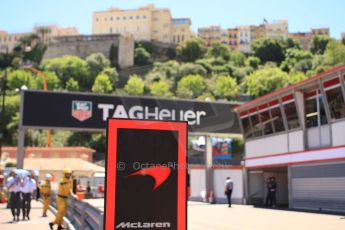 World © 2013 Octane Photographic Ltd. F1 Monaco GP, Monte Carlo - Thursday 23rd May 2013 - Practice 1. Vodafone McLaren Mercedes and TAG Heuer logos in the pit lane. Digital Ref : 0692cb7d1087