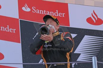 World © 2013 Octane Photographic Ltd. F1 Spanish GP, Circuit de Catalunya - Sunday 12th May 2013 - Race. Lotus F1 Team - Kimi Raikkonen takes a good taste of his podium champagne. Digital Ref : 0674cb1d3021