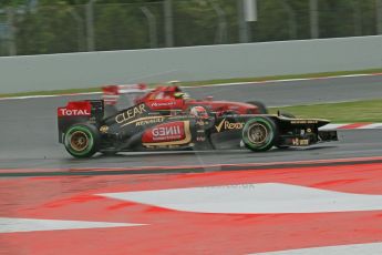 World © Octane Photographic Ltd. F1 Spanish GP, Circuit de Catalunya, Friday 10th May 2013. Practice 1. Romain Grosjean - Lotus and Felipe Massa - Scuderia Ferrari. Digital Ref : 0659cb1d9009