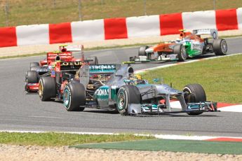 World © 2013 Octane Photographic Ltd. F1 Spanish GP, Circuit de Catalunya - Sunday 12th May 2013 - Race. Mercedes W04 – Nico Rosberg leading the opening lap. Digital Ref: 0673cb7d9398