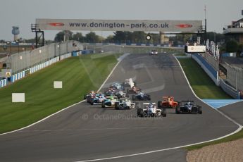 World © Octane Photographic Ltd. BRDC Formula 4 (F4) Race 1, Donington Park 28th September 2013. MSVF4-13, Lanan Racing, Jake Hughes leads the pack as the race starts as James Greenway's nose bodywork goes flying. Digital Ref : 0833lw1d9221