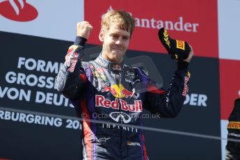 World © Octane Photographic Ltd. F1 German GP - Nurburgring. Sunday 7th July 2013 - Podium. Infiniti Red Bull Racing - Race Winner Sebastian Vettel. Digital Ref : 0750au8i0343