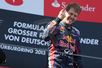 World © Octane Photographic Ltd. F1 German GP - Nurburgring. Sunday 7th July 2013 - Podium. Infiniti Red Bull Racing - Race Winner Sebastian Vettel. Digital Ref : 0750au8i0367