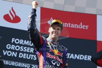 World © Octane Photographic Ltd. F1 German GP - Nurburgring. Sunday 7th July 2013 - Podium. Infiniti Red Bull Racing - Race Winner Sebastian Vettel. Digital Ref : 0750au8i0395