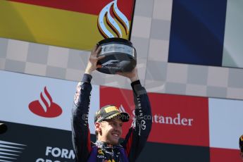 World © Octane Photographic Ltd. F1 German GP - Nurburgring. Sunday 7th July 2013 - Podium. Infiniti Red Bull Racing - Race Winner Sebastian Vettel. Digital Ref : 0750au8i0404