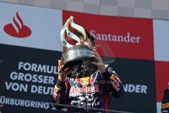 World © Octane Photographic Ltd. F1 German GP - Nurburgring. Sunday 7th July 2013 - Podium. Infiniti Red Bull Racing - Race Winner Sebastian Vettel. Digital Ref : 0750au8i0410