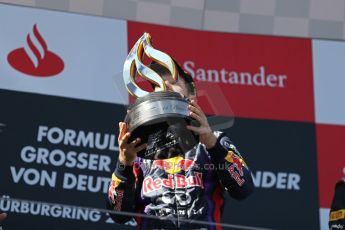 World © Octane Photographic Ltd. F1 German GP - Nurburgring. Sunday 7th July 2013 - Podium. Infiniti Red Bull Racing - Race Winner Sebastian Vettel. Digital Ref : 0750au8i0410