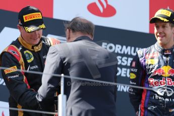 World © Octane Photographic Ltd. F1 German GP - Nurburgring. Sunday 7th July 2013 - Podium. Lotus F1 Team - Kimi Raikkonen recieves his trophey. Digital Ref : 0750au8i0448