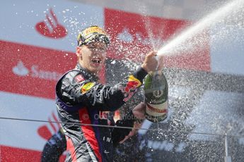 World © Octane Photographic Ltd. F1 German GP - Nurburgring. Sunday 7th July 2013 - Podium. Infiniti Red Bull Racing - Race Winner Sebastian Vettel celebrates. Digital Ref : 0750au8i0535