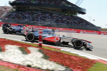 World © Octane Photographic Ltd. F1 German GP - Nurburgring. Sunday 7th July 2013 - Race. Vodafone McLaren Mercedes MP4/28 - Sergio Perez and Williams FW35 - Valtteri Bottas. Digital Ref : 0749lw1dx0157