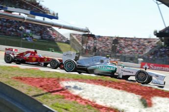 World © Octane Photographic Ltd. F1 German GP - Nurburgring. Sunday 7th July 2013 - Race. Mercedes AMG Petronas F1 W04 – Lewis Hamilton and Scuderia Ferrari F138 - Fernando Alonso. Digital Ref : 0749lw1dx0234