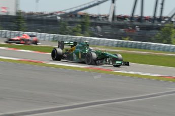 World © Octane Photographic Ltd. F1 German GP - Nurburgring. Sunday 7th July 2013 - Race. Caterham F1 Team CT03 - Giedo van der Garde and Marussia F1 Team MR02 - Jules Bianchi. Digital Ref : 0749lw1dx9706