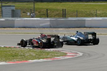 World © Octane Photographic Ltd. F1 German GP - Nurburgring. Sunday 7th July 2013 - Race. The Lotus F1 Team E21 of Kimi Raikkonen overtakes the Mercedes AMG Petronas F1 W04 of Lewis Hamilton. Digital Ref : 0749lw1dx9760
