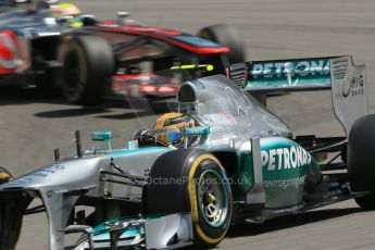 World © Octane Photographic Ltd. F1 German GP - Nurburgring, Saturday 6th July 2013 - Qualifying. Mercedes AMG Petronas F1 W04 – Lewis Hamilton and Vodafone McLaren Mercedes MP4/28 - Sergio Perez. Digital Ref : 0745lw1d7391