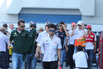 World © Octane Photographic Ltd. F1 German GP - Nurburgring, Sunday 7th July 2013 - Paddock. Sergio Perez, Giedo van der Garde, Daniel Ricciardo, Esteban Gutierrez, Mark Webber, Paul di Resta, Jenson Button and Fernando Alonso. Digital Ref : 0748lw1dx9153