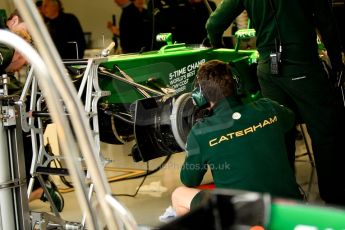 World © Octane Photographic Ltd. F1 British GP - Silverstone, Friday 28th June 2013 - Practice 1. Caterham F1 Team CT03 Garage. Digital Ref : 0724ce1d6843