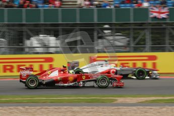 World © Octane Photographic Ltd. F1 British GP - Silverstone, Friday 28th June 2013 - Practice 2. Scuderia Ferrari F138 - Felipe Massa being passed by Vodafone McLaren Mercedes MP4/28 - Sergio Perez. Digital Ref : 0726lw1d9878