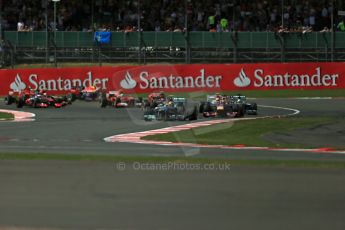 World © Octane Photographic Ltd. F1 British GP - Silverstone, Sunday 30th June 2013 - Race. Mercedes AMG Petronas F1 W04 – Lewis Hamilton leads the pack. Digital Ref : 0734lw1d2338