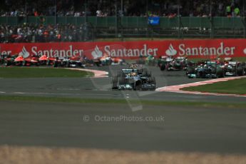 World © Octane Photographic Ltd. F1 British GP - Silverstone, Sunday 30th June 2013 - Race. Mercedes AMG Petronas F1 W04 – Lewis Hamilton leads the pack. Digital Ref : 0734lw1d2344