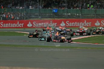 World © Octane Photographic Ltd. F1 British GP - Silverstone, Sunday 30th June 2013 – Race. Infiniti Red Bull Racing RB9 - Sebastian Vettel and Mercedes AMG Petronas F1 W04 - Nico Rosberg. Digital Ref : 0734lw1d2351