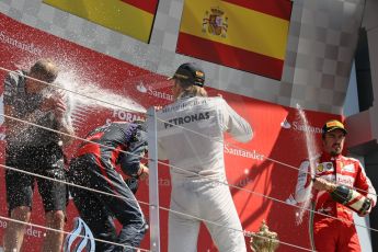 World © Octane Photographic Ltd. F1 British GP - Silverstone, Sunday 30th June 2013 - Race. Mercedes AMG Petronas F1 W04 - Nico Rosberg celebrates his win on the podium. Digital Ref : 0734lw1d2877