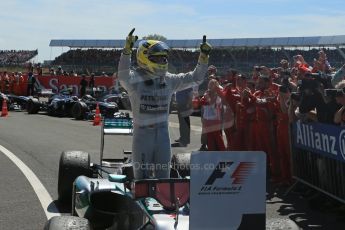 World © Octane Photographic Ltd. F1 British GP - Silverstone, Sunday 30th June 2013 - Race. Mercedes AMG Petronas F1 W04 - Nico Rosberg celebrates his win in Parc Ferme. Digital Ref : 0734lw1dx2746