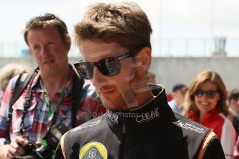 World © Octane Photographic Ltd. F1 British GP - Silverstone, Sunday 30th June 2013 – F1 Paddock. Romain Grosjean - Lotus F1 Team. Digital Ref : 0733lw1d1974