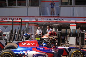 World © Octane Photographic Ltd. GP2 Monaco GP, Monte Carlo, Thursday 23rd May 2013. Practice and Qualifying. Jolyon Palmer pits with father Jonathan watching from the balcony - Carlin. Digital Ref : 0693cb7d1000