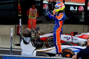 World © Octane Photographic Ltd./Chris Enion. GP2 British GP, Silverstone, Sunday 30th June 2013. Race 2 winner Jon Lancaster - Hilmer Motorsport celebrates in Parc Ferme. Digital Ref : 0732ce1d9513