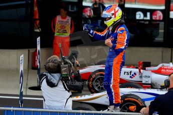 World © Octane Photographic Ltd./Chris Enion. GP2 British GP, Silverstone, Sunday 30th June 2013. Race 2 winner Jon Lancaster - Hilmer Motorsport celebrates in Parc Ferme. Digital Ref : 0732ce1d9519