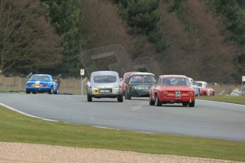 World © Octane Photographic Ltd. Donington Park 80th Anniversary Meeting (March 1933 – March 2013). HSCC Historic Road Sports Championship supported by Witchampton Garage (Inc. Class B2 Guards Trophy). The pack head into Hollywood around Redgate. Digital Ref : 0594lw1d6873