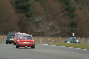 World © Octane Photographic Ltd. Donington Park 80th Anniversary Meeting (March 1933 – March 2013). HSCC Historic Road Sports Championship supported by Witchampton Garage (Inc. Class B2 Guards Trophy). The pack head into Hollywood around Redgate. Digital Ref : 0594lw1d6873