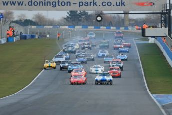 World © Octane Photographic Ltd. Donington Park 80th Anniversary Meeting (March 1933 – March 2013). HSCC Guards Trophy Car Championship supported by Dunlop Tyres. Craig Davies in his Chevrolet Corvette and Ross Maxwell in his Chevron B8 lead the pack off the line pack on the opening lap. Digital Ref : 0597lw1d7467