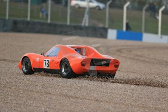 World © Octane Photographic Ltd. Donington Park 80th Anniversary Meeting (March 1933 – March 2013). HSCC Guards Trophy Car Championship supported by Dunlop Tyres. Neil Burroughs – Chevron B8 skates through the gravel at Redgate. Digital Ref : 0597lw1d7489