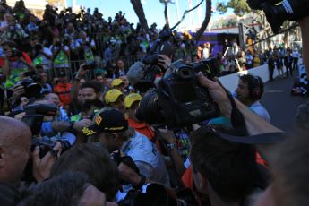 World © Octane Photographic Ltd. F1 Monaco GP, Monte Carlo - Sunday 26th May - Podium and celebrations. The press scrum around race winner Nico Rosberg of Mercedes AMG Petronas. Digital Ref : 0712lw1d1981