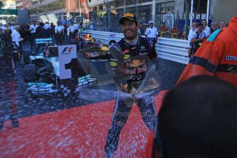 World © Octane Photographic Ltd. F1 Monaco GP, Monte Carlo - Sunday 26th May - Podium and celebrations. Infiniti Red Bull Racing's Mark Webber sprays the team and the media with champagne. Digital Ref : 0712lw1d2063