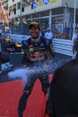 World © Octane Photographic Ltd. F1 Monaco GP, Monte Carlo - Sunday 26th May - Podium and celebrations. Infiniti Red Bull Racing's Mark Webber sprays the team and the media with champagne. Digital Ref : 0712lw1d2064