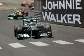 World © Octane Photographic Ltd. F1 Monaco GP, Monte Carlo - Sunday 26th May - Race. The Mercedes AMG Petronas F1 W04 of Nico Rosberg leads Lewis Hamilton and the Infiniti Red Bull Racing RB9 of Sebastian Vettel up the hill. Digital Ref : 0711lw1d1094