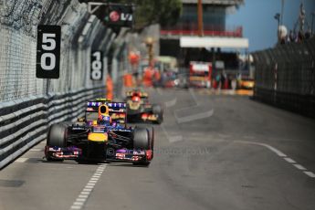 World © Octane Photographic Ltd. F1 Monaco GP, Monte Carlo - Sunday 26th May - Race. The Infiniti Red Bull Racing RB9 of Mark Webber and the Lotus F1 Team E21 of Kimi Raikkonen race out of Nouvelle Chicane. Digital Ref :