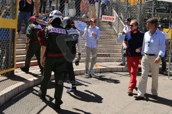 World © Octane Photographic Ltd. F1 Monaco GP, Monte Carlo - Sunday 26th May - Race. Williams FW35 - Pastor Maldonado walks back to the pits after the accident. Digital Ref : 0711lw1d1801