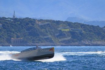 World © Octane Photographic Ltd. One of Infiniti Red Bull Racing's shuttle motor boats lifts onto the plane. Digital Ref : 07137d2980