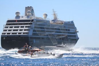 World © Octane Photographic Ltd. The 180m Azamara Quest (owned by Azamara Club Cruises) is the background to the traffic heading in and out of the Monaco harbour. Digital Ref : 07137d2937