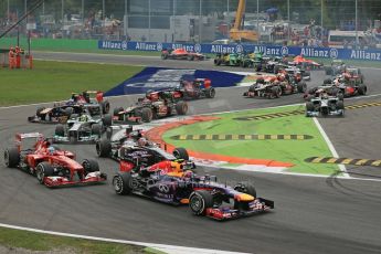 World © Octane Photographic Ltd. F1 Italian GP - Monza, Sunday 8th September 2013 - Race. Mercedes AMG Petronas F1 W04 – Lewis Hamilton cuts the apex. Digital Ref : 0824lw1d6115