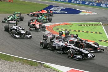 World © Octane Photographic Ltd. F1 Italian GP - Monza, Sunday 8th September 2013 - Race. Williams, Marussia and Caterham fight it out at the back with Gutierrez's Sauber. Digital Ref : 0824lw1d6142