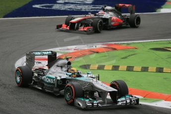 World © Octane Photographic Ltd. F1 Italian GP - Monza, Sunday 8th September 2013 - Race. Mercedes AMG Petronas F1 W04 – Lewis Hamilton leads Vodafone McLaren Mercedes MP4/28 - Jenson Button. Digital Ref : 0824lw1d6220