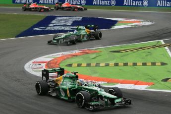 World © Octane Photographic Ltd. F1 Italian GP - Monza, Sunday 8th September 2013 - Race. Caterham F1 Team CT03 - Charles Pic leads Giedo van der Garde and the 2 Marussia F1 Team MR02 of Jules Bianchi and Max Chilton. Digital Ref : 0824lw1d6280