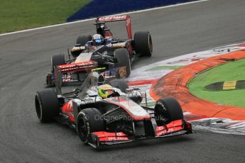 World © Octane Photographic Ltd. F1 Italian GP - Monza, Sunday 8th September 2013 - Race. Vodafone McLaren Mercedes MP4/28 - Sergio Perez leads Scuderia Toro Rosso STR8 - Jean-Eric Vergne. Digital Ref : 0824lw1d6327