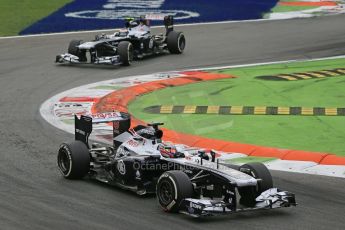 World © Octane Photographic Ltd. F1 Italian GP - Monza, Sunday 8th September 2013 - Race. Williams FW35 - Pastor Maldonado leads Valtteri Bottas. Digital Ref : 0824lw1d6350