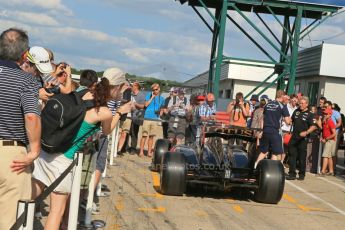 World © Octane Photographic Ltd. Formula 1 - Young Driver Test - Silverstone. Friday 19th July 2013. Day 3. Lotus F1 Team E21 Show car with fans. Digital Ref : 0755lw1d0245